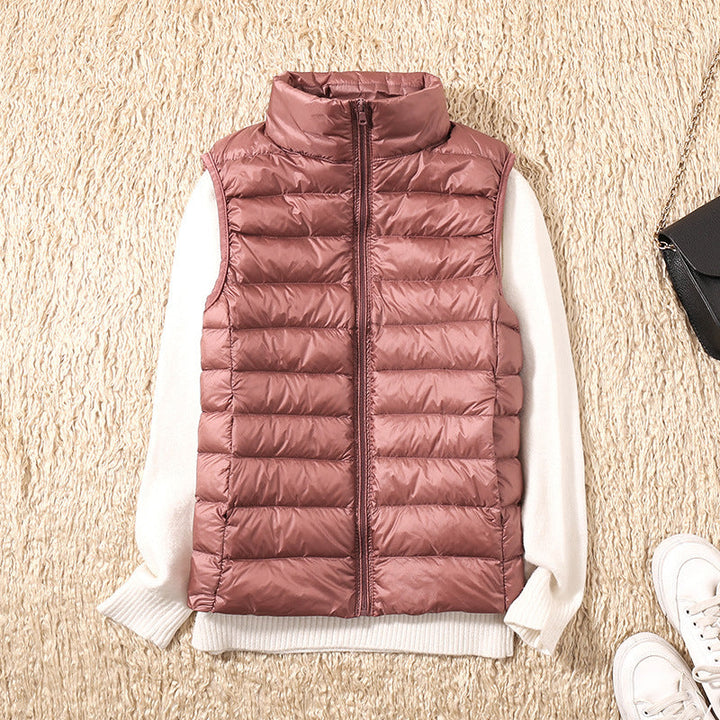 Paula - Ny vest med hvide andefjer